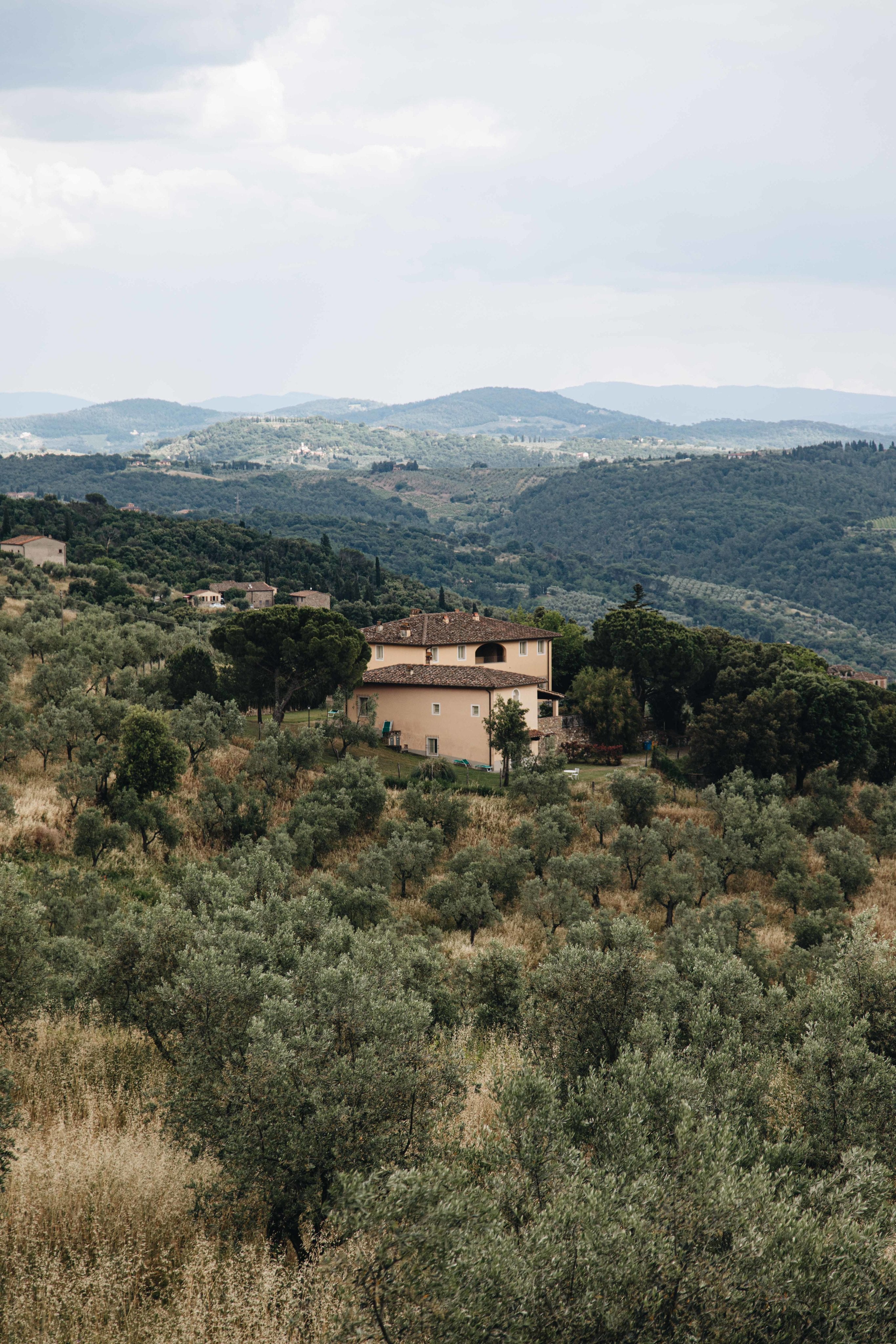 house-nestled-within-the-mountains
